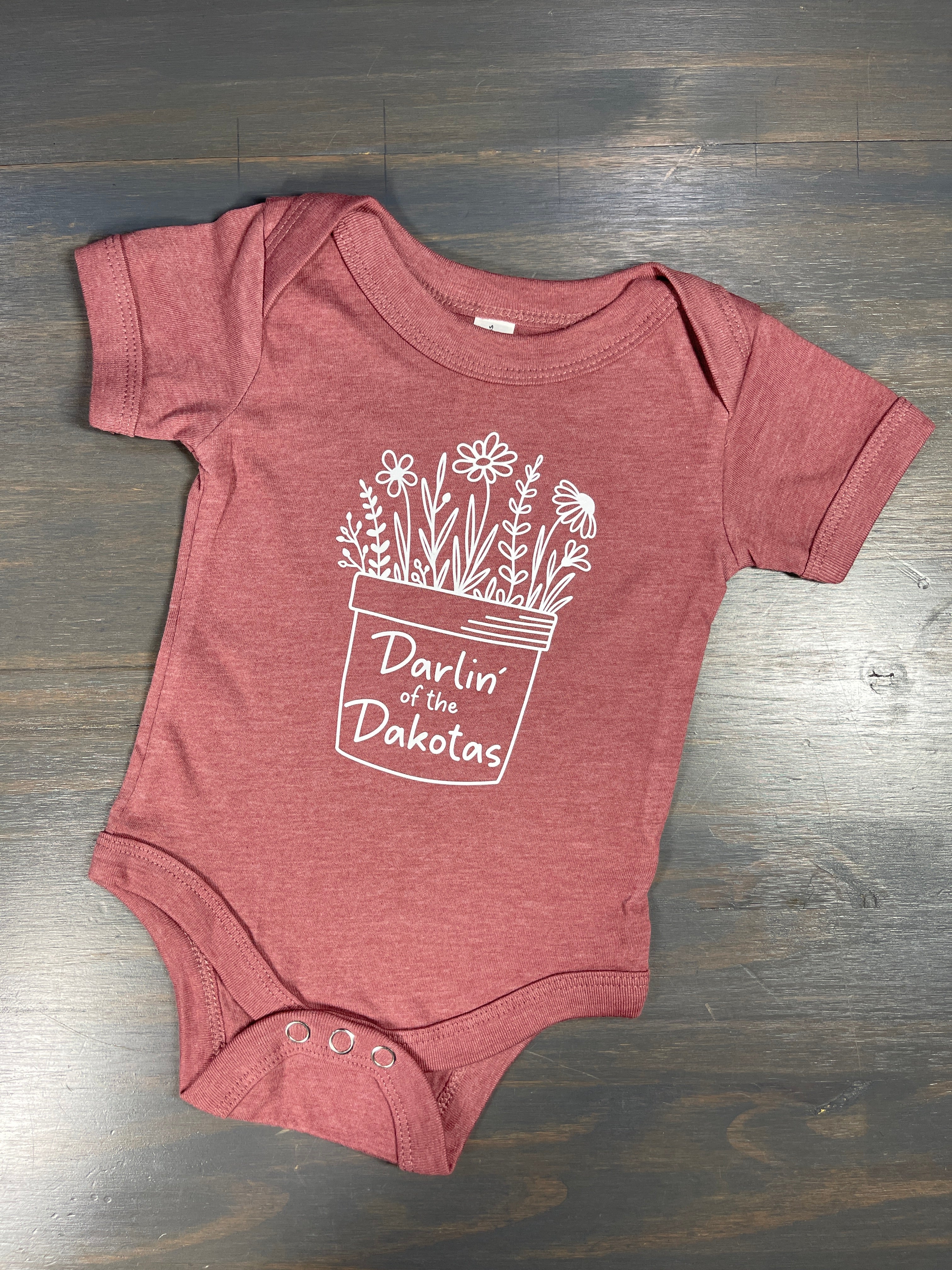 Darlin' of the Dakotas Onsie